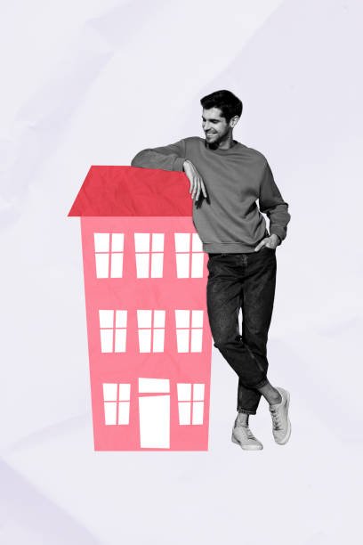 A confident man in a gray sweatshirt and jeans leans casually against a stylized pink apartment building, symbolizing a modern man upgrading his living space with masculine, budget-friendly decor.
