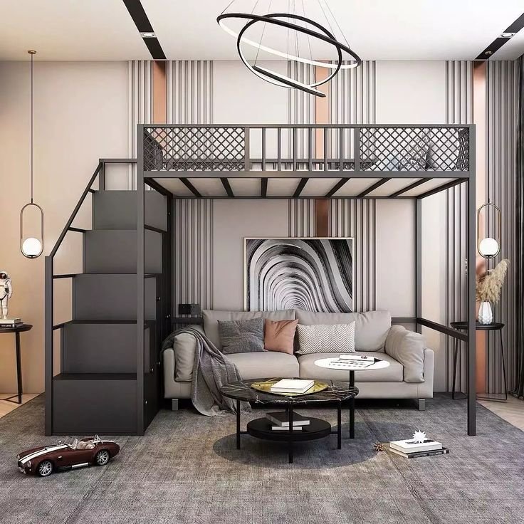 a lofted bedroom with a steel staircase overlooking a 1500 square foot great room