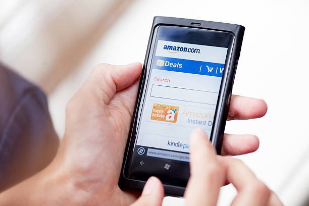 A person searching for unique tech finds on the Amazon mobile website using a smartphone.